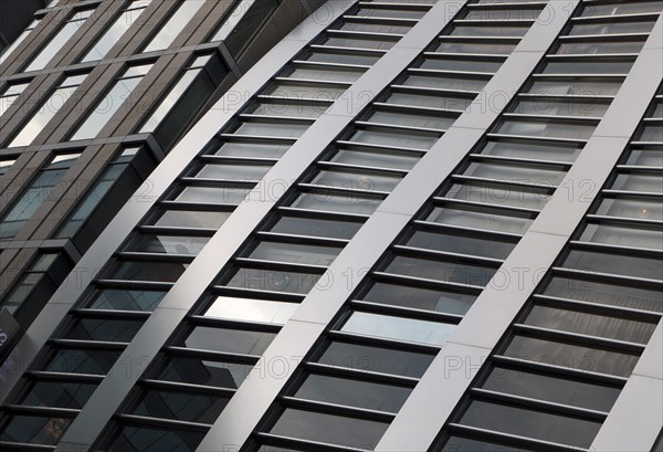 Japan, Honshu, Tokyo, Ginza. Detail of the facade of the new DeBeers Building with distictive curved form. 
Photo : Jon Burbank