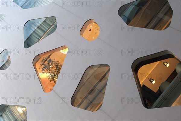 Japan, Honshu, Tokyo, Ginza. Detail of facade of the new Mikimoto Building with distinctive windows. 
Photo : Jon Burbank