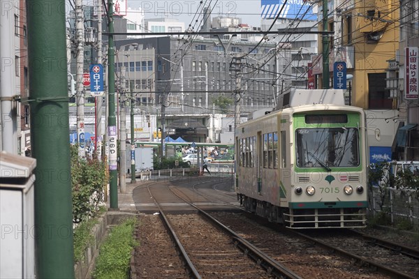 Japan, Honshu, Tokyo, Otsuka near Otsuka JR train station Tokyos last remaining electric trolley line the Toden Arakawa line. 
Photo : Jon Burbank