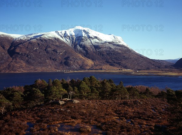 Scotland, Highlands, Torridon, View across Loch Torridon towards south face of Liathach 1055 metres at highest point with snow topped summit. 
Photo : Bryan Pickering