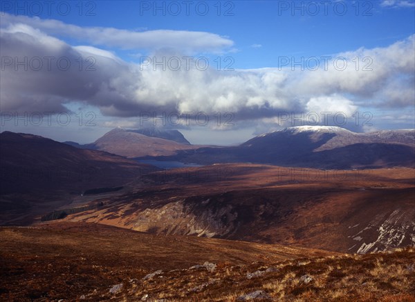 Scotland, Highlands, West, View north west from Beinn-An-Fhuarain circa 1500 feet towards left to right Quinag at 806 metres and snow topped Glas Bheinn at 716 metres. 
Photo : Bryan Pickering
