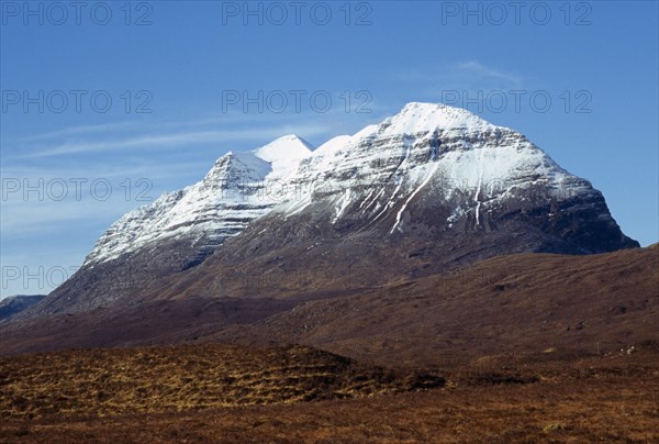 Scotland, West Highlands, Torridon, South east view of Liathach 1055 metres at highest point with snow topped summit. Seen from Glen Torridon. 
Photo : Bryan Pickering