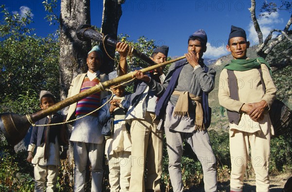 Nepal, East, Sangawa Khola Valley, Musicians taking part in wedding procession. 
Photo : Chris Beall