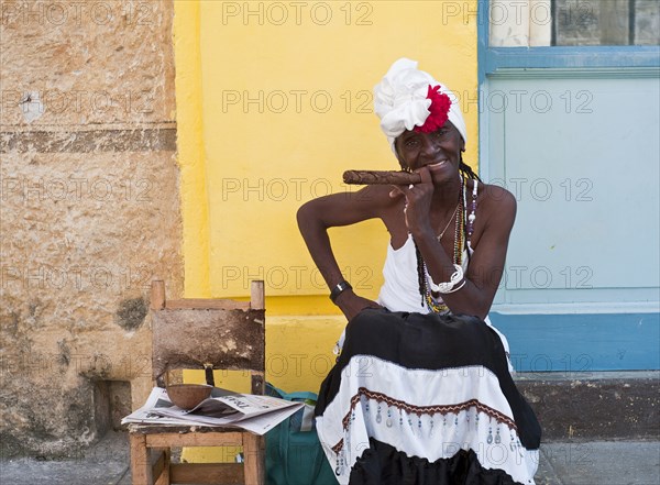 Cuba, Havana, Old Town Cigar Lady charges tourists $1 for a picture. 
Photo : Richard Rickard