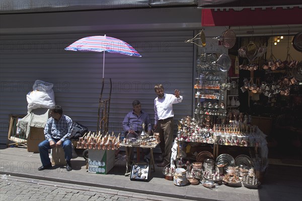 Turkey, Istanbul, Eminonu Misir Carsisi Spice Market metal goods vendors at the entrance. 
Photo : Stephen Rafferty