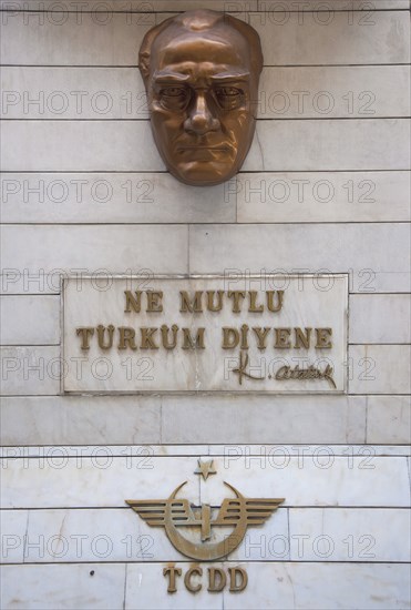 Turkey, Istanbul, Sirkeci Gar railway station interior bronze plaque of Ataturk. 
Photo : Stephen Rafferty