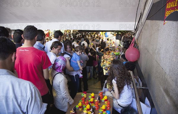 Turkey, Istanbul, Eminonu busy subway with stall selling childrens toys. 
Photo : Stephen Rafferty