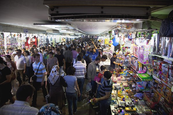 Turkey, Istanbul, Eminonu busy subway with stall selling childrens toys. 
Photo : Stephen Rafferty