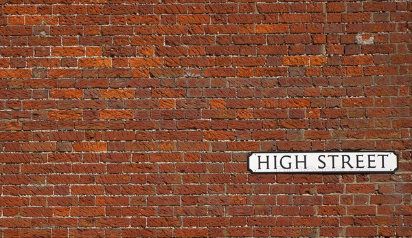 Cummunications, Signage, High Street sign in red brick wall. 
Photo : Stephen Rafferty