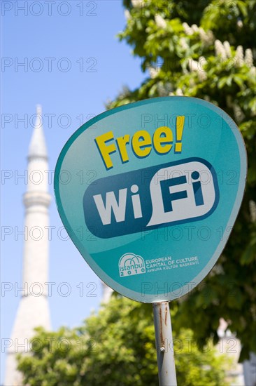 Turkey, Istanbul, Sultanahmet Haghia Sophia minaret behind sign for Free Wifi hotspot. 
Photo : Paul Seheult