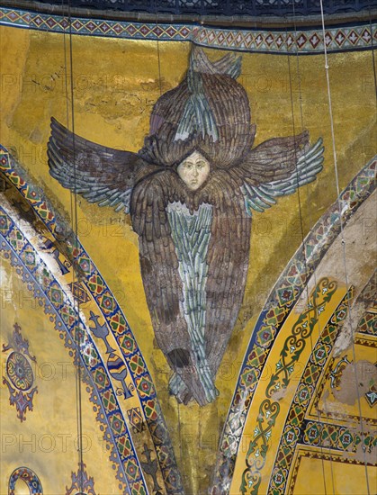 Turkey, Istanbul, Sultanahmet Haghia Sophia Mural of a six winged seraph or angel below the central dome. 
Photo : Paul Seheult