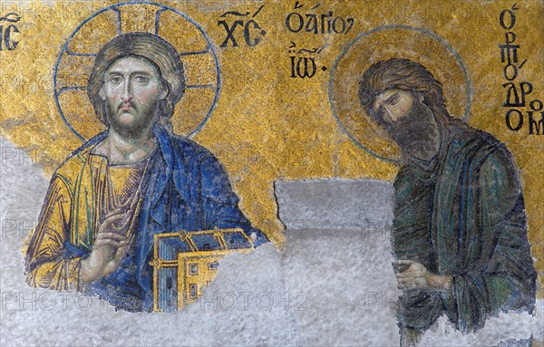 Turkey, Istanbul, Sultanahmet Haghia Sophia the 13th Century Deesis mosaic of Jesus Christ and St John The Baptist in the South Gallery. 
Photo : Paul Seheult