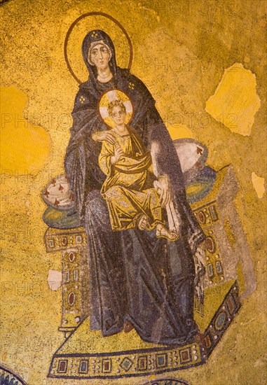 Turkey, Istanbul, Sultanahmet Haghia Sophia Mural of Virgin Mary holding the baby infant Jesus in the domed interior. 
Photo : Paul Seheult