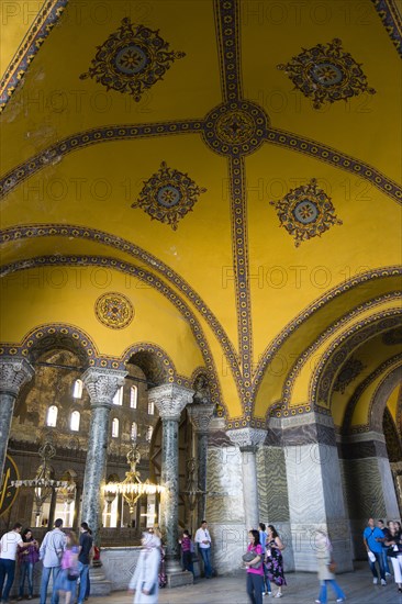 Turkey, Istanbul, Sultanahmet Haghia Sophia Tourists in the vaulted decorative North Gallery. 
Photo : Paul Seheult
