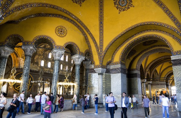 Turkey, Istanbul, Sultanahmet Haghia Sophia Tourists in the vaulted decorative North Gallery. 
Photo : Paul Seheult