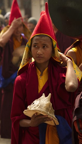 Buddhist monk in a Losar ceremonial procession, Sikkim, India