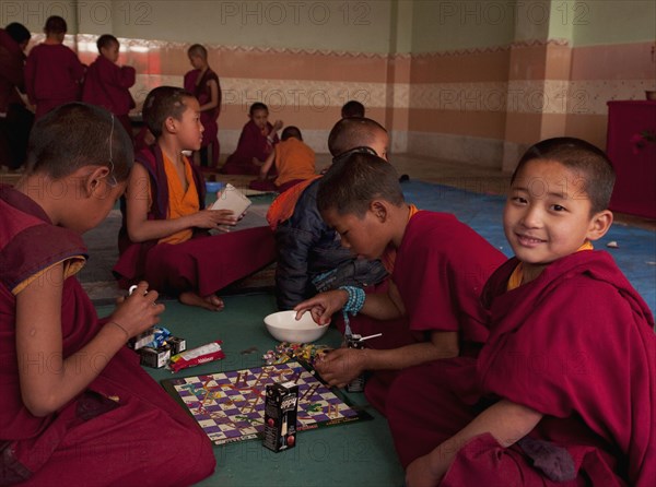 Buddhist student Monks playing board games, Sikkim, India