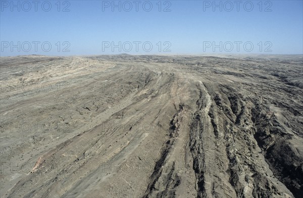 Namibia, North, Landscape, Rocky desert on the border between Northern Namibia and Angola. The border is indeterminate at this point. 
Photo : Adrian Arbib