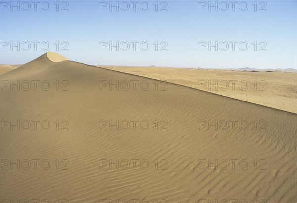 Namibia, Namib, Naukluft Desert, Sand dunes in the De Beers Diamond mining area. 
Photo : Adrian Arbib