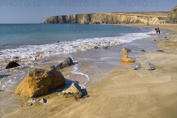 Ireland, County Waterford, Tramore, Kilfarrasy Beach and coastline with people riding horseback. 
Photo : Hugh Rooney