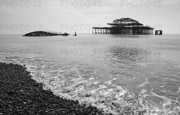 England, East Sussex, Brighton, Ruins of the burnt out West Pier fallen into the sea. 
Photo : Patrick Field