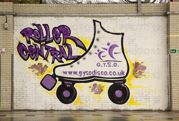 Art, Graffiti, Former parcel delivery warehouse converted into roller disco with the walls decorated by local graffiti artists. Skate painted on wall advertising GYSO. 
Photo : Stephen Rafferty