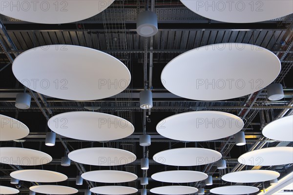 England, London, Heathrow Airport Terminal 5 disc ceiling in departures area. 
Photo : Paul Seheult