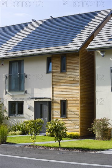 Architecture, Environment, Solar Power, Alternative Energy Electricity Solar photovoltaic roof tiles or slates on new houses by Linden Homes in Graylingwell Park. 
Photo : Paul Seheult