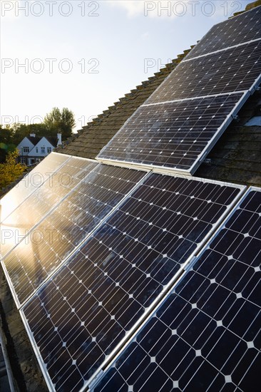 Architecture, Environment, Solar Panels, Alternative Energy Electricity Solar photovoltaic roof panels on detached house for electricity conversion. 
Photo : Paul Seheult