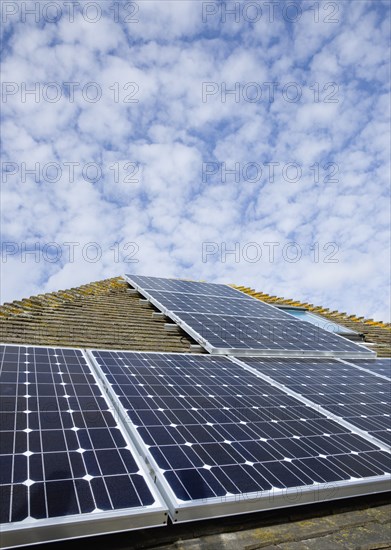 Architecture, Environment, Solar Panels, Alternative Energy Electricity Solar photovoltaic roof panels on detached house for electricity conversion. 
Photo : Paul Seheult