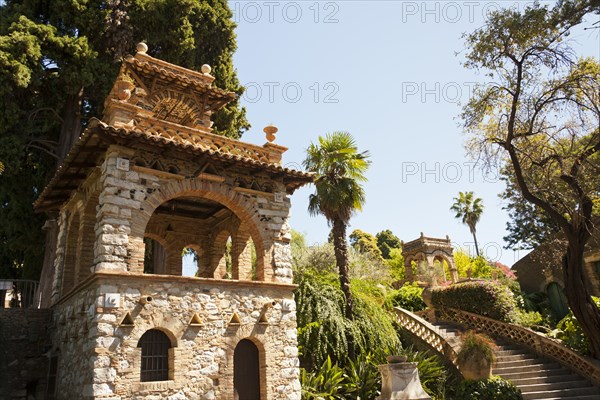 Italy, Sicily, Taormina, Via Bagnoli Croce Villa Comunale A building in Trevelyan Public Gardens. 
Photo : Mel Longhurst