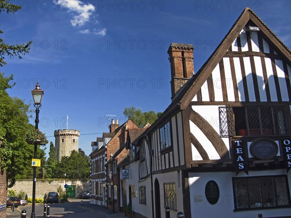 England, Warwickshire, Wawick Castle, View of Tea Shop with Warwick Castle Guys Tower. 
Photo : Chris Penn