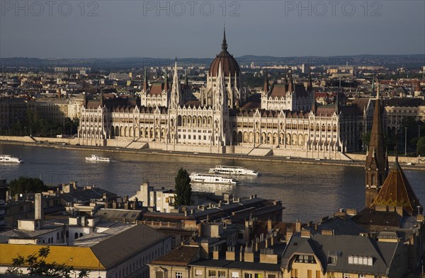 Buda Castle District view over Danube and Pest with Parliament Building.