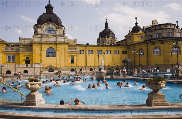 Pest Outdoor bathing in summer at Szechenyi thermal baths largest in Europe.