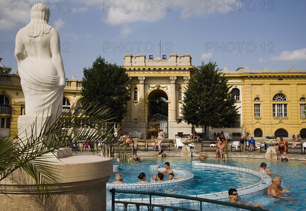 Pest Outdoor bathing in summer at Szechenyi thermal baths largest in Europe.