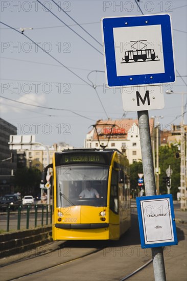 Tram arriving at stop in Pest city centre.