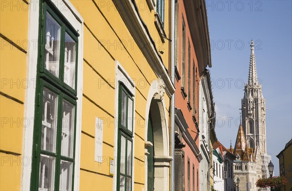 Buda Castle District: Matyas Church viewed from street of restored facades.