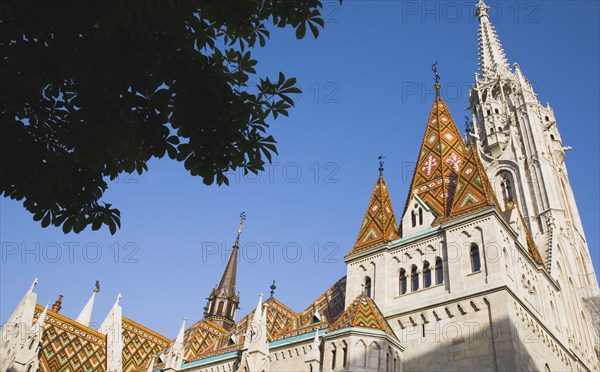 Buda Castle District Matyas Church with tiled Bela tower.