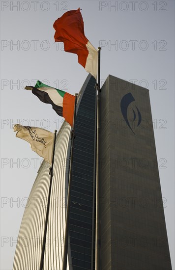 National Bank of Dubai building with flags overlooking the Creek.