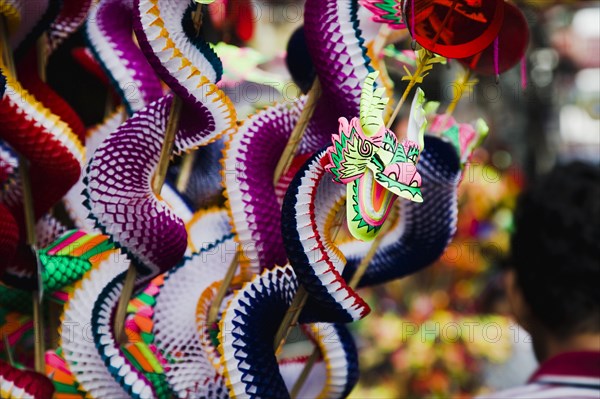 Children's toy dragon on stall in Chinatown for Chinese New Year.