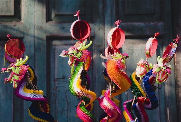 Paper Dragon rattle decorations for Chinese New Year.