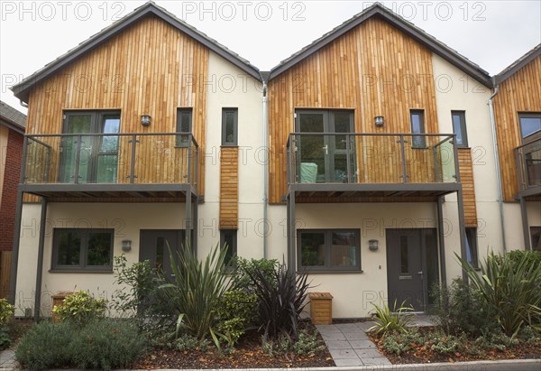 Graylingwell Park Modern housing with solar panels blended seamlessly in to roof tiles.