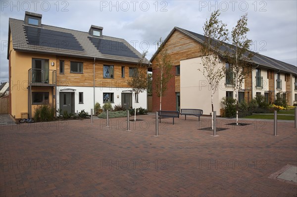 Graylingwell Park Modern housing with solar panels blended seamlessly in to roof tiles.