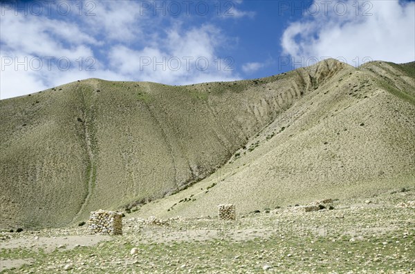 Protective stone walls along the route from Ghemi to Lo Manthang.