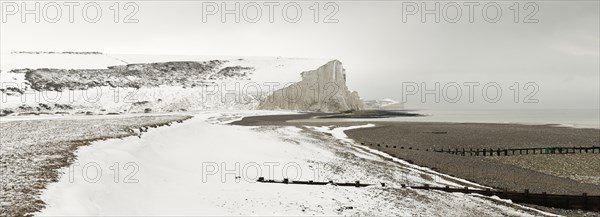 Seven Sisters Snow covered chalk cliffs viewed from the coastguard cottages at Cuckmere Haven.