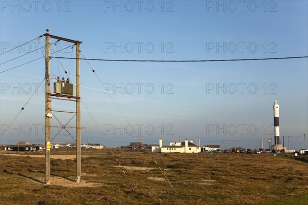 View toward the Light Railway Cafe with power cables in the foreground.