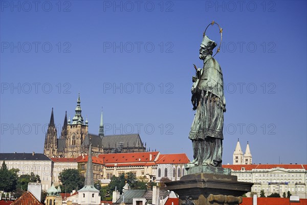 Charles Bridge Statue of St John of Nepomuk with St Vitus.