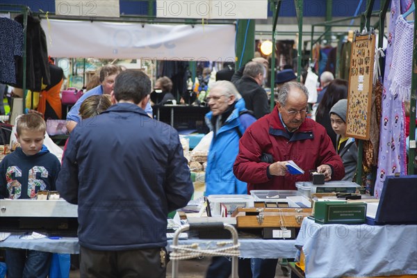 St Georges Market stall selling coins and currency.