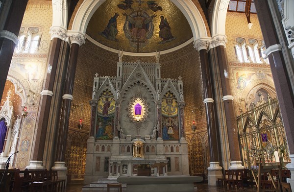 Falls Road Clonard Monastery interior decorated for Good Friday with statues draped in purple cloth.