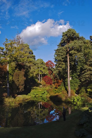 Leonardslee Lakes and Gardens Middle Pond and autumn trees.